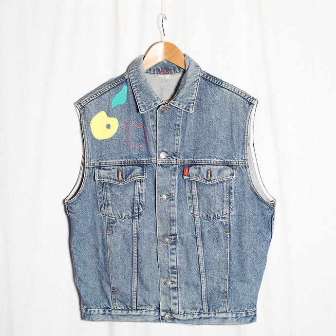 Veste en jean's sans manche